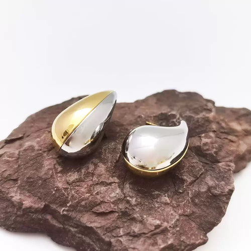 Boucles d'oreilles bicolores or et argent détail finition brillante