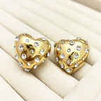 Boucles d'oreilles cœur précieux finition or avec strass
