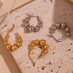 Créoles perles finition or et argenté