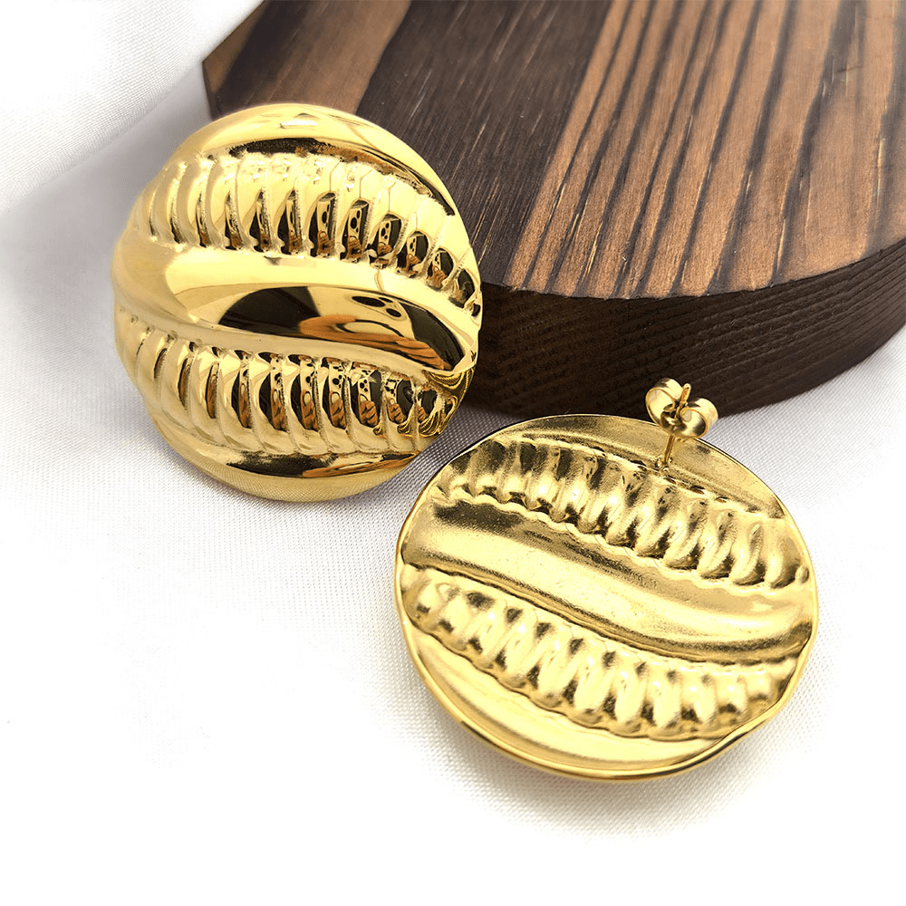 Boucles d'oreilles sphère striées finition or texture verticale